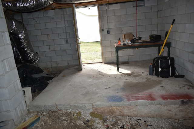 basement featuring concrete block wall