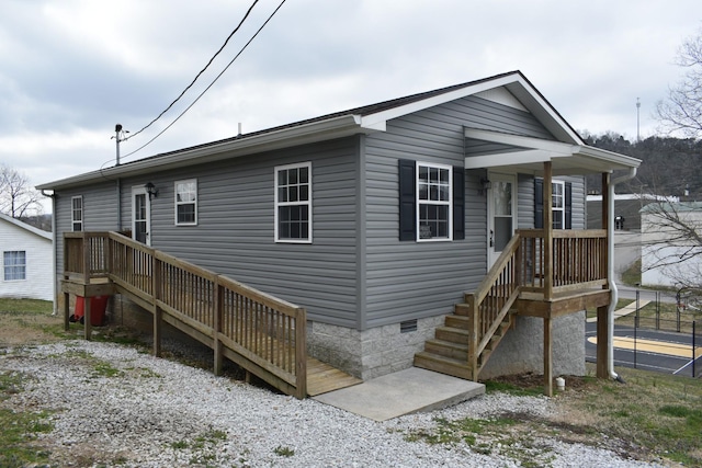 view of front of house featuring crawl space