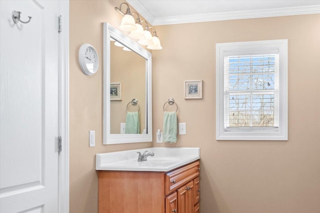 bathroom with vanity and ornamental molding