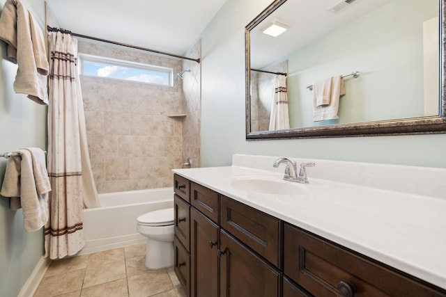 bathroom featuring tile patterned floors, visible vents, toilet, shower / tub combo, and vanity