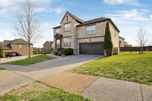 traditional home featuring a front lawn, an attached garage, fence, and driveway