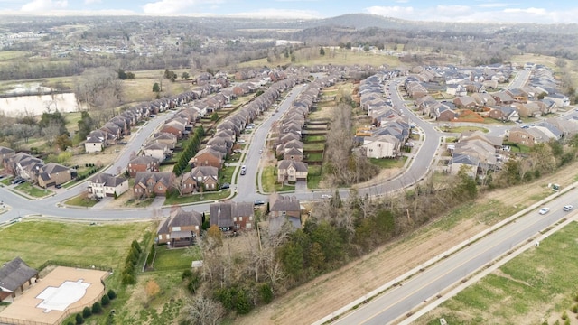 birds eye view of property with a residential view