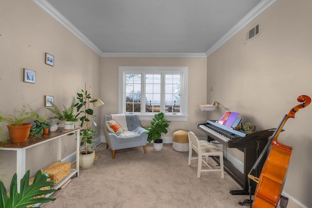 carpeted home office with visible vents, crown molding, and baseboards