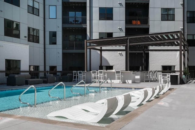 pool featuring a patio area