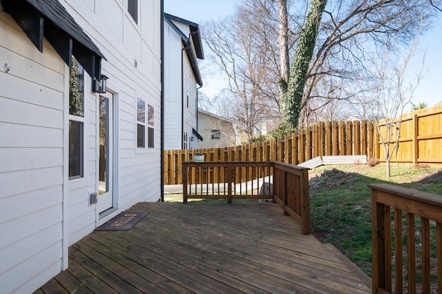 wooden deck featuring fence