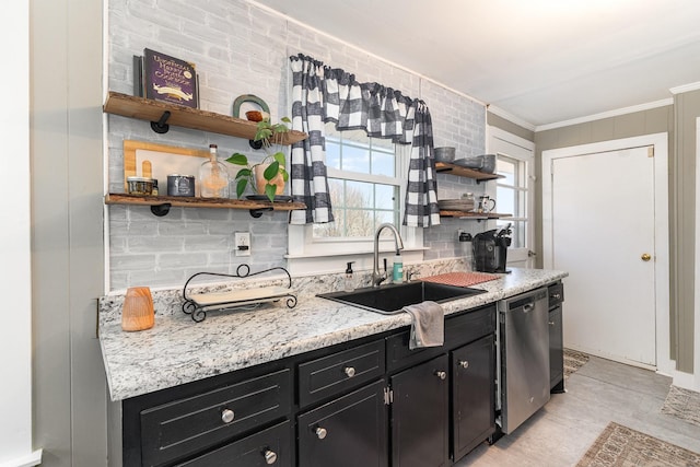 kitchen featuring a sink, open shelves, dishwasher, ornamental molding, and dark cabinets