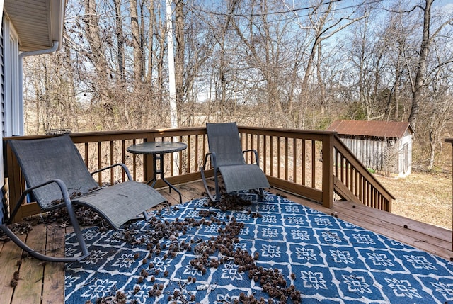 deck featuring an outbuilding