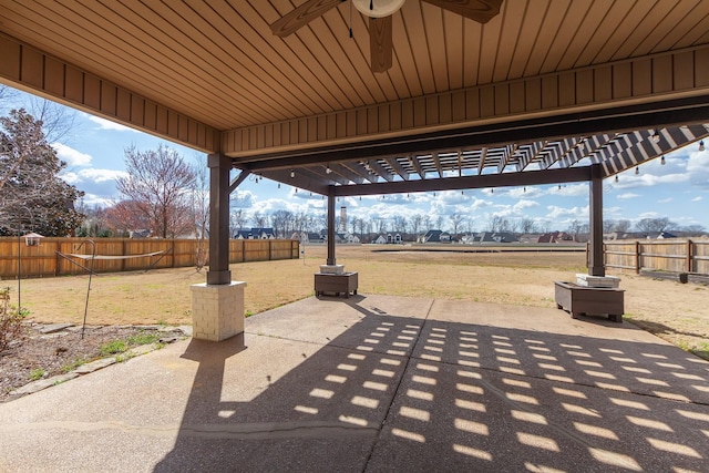 view of patio with a pergola and a fenced backyard