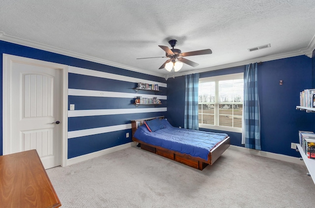 carpeted bedroom featuring crown molding, baseboards, visible vents, and a textured ceiling