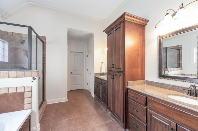 bathroom featuring tile patterned floors, two vanities, a stall shower, a sink, and crown molding