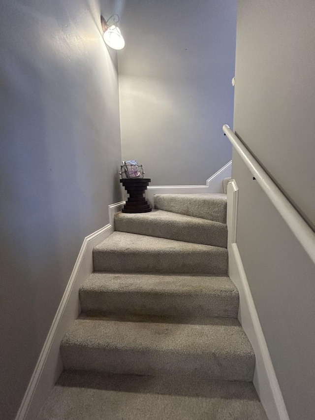 stairway with baseboards