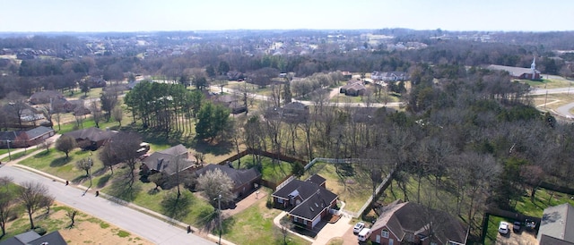 birds eye view of property with a residential view