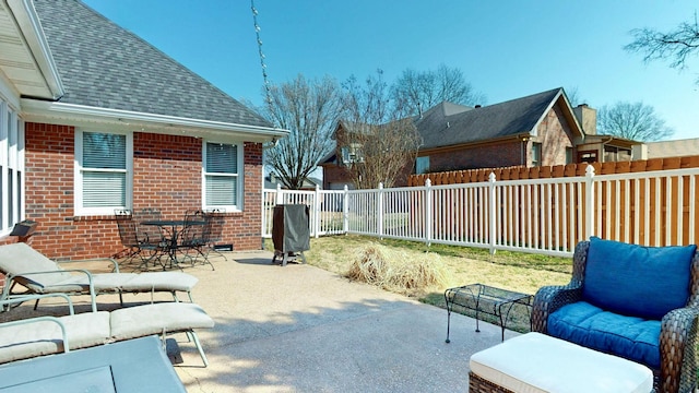 view of patio with a fenced backyard