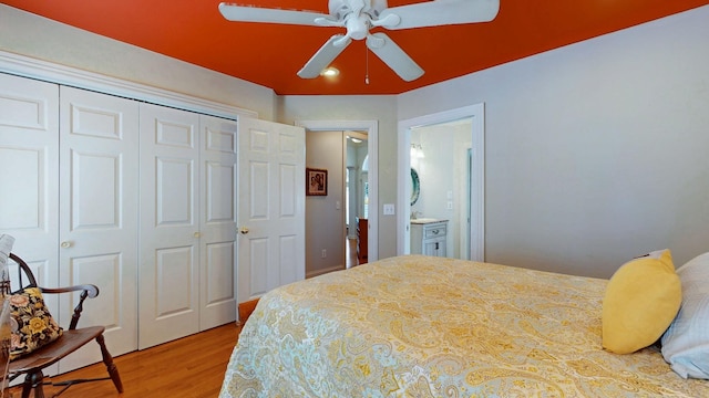 bedroom with ceiling fan, a closet, and wood finished floors