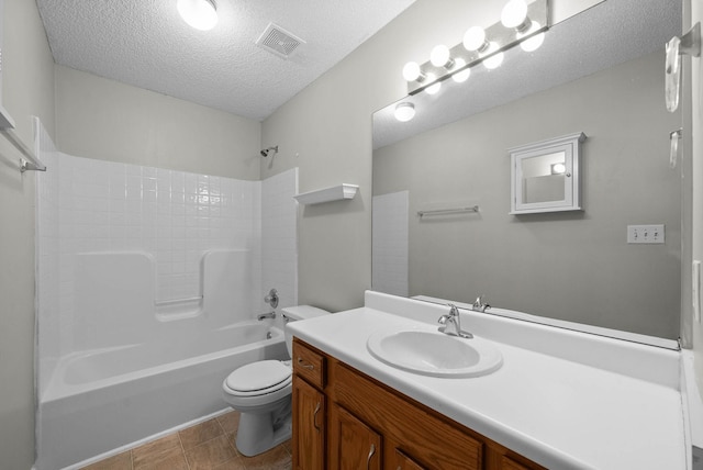 full bathroom with vanity, visible vents, a textured ceiling, shower / bathing tub combination, and toilet