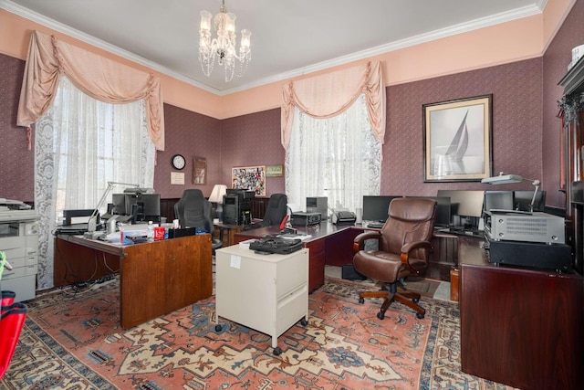 office with wallpapered walls, crown molding, and a notable chandelier