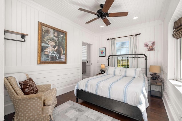 bedroom featuring crown molding, wood ceiling, wood finished floors, and ceiling fan