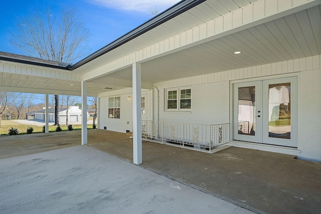 view of patio with an attached carport and french doors