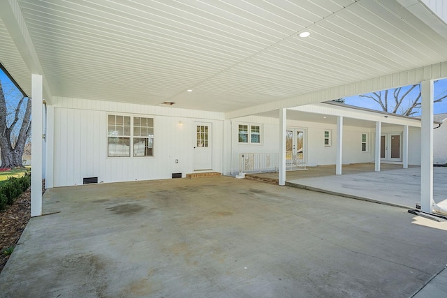 view of patio featuring french doors and a carport