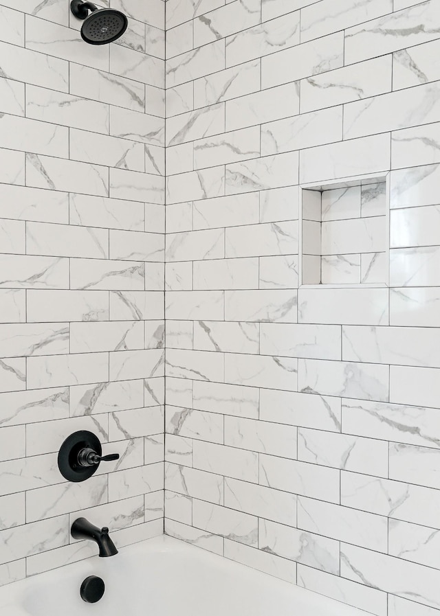 full bathroom featuring tub / shower combination