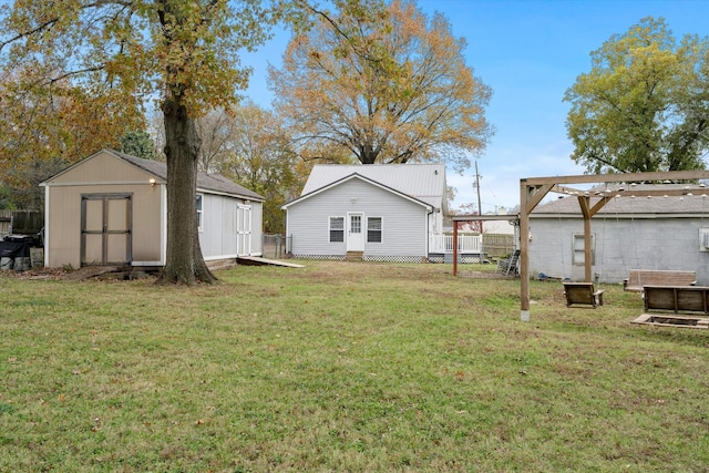 view of yard featuring a shed and an outdoor structure