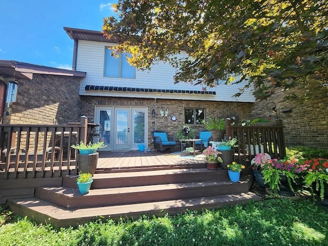 back of property featuring french doors and a deck