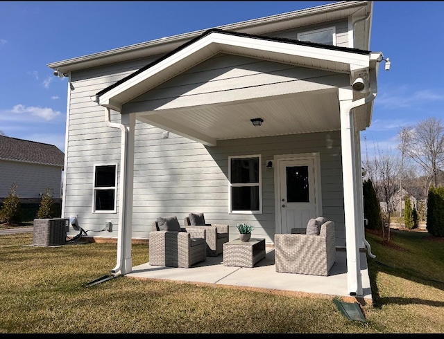 back of property featuring central air condition unit, a lawn, an outdoor hangout area, and a patio