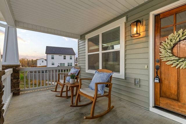 view of patio featuring a porch