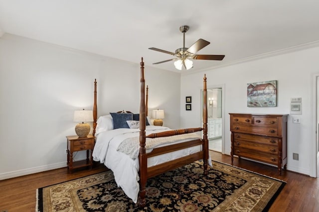 bedroom featuring ceiling fan, connected bathroom, baseboards, and wood finished floors