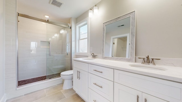 full bathroom featuring a sink, visible vents, and toilet