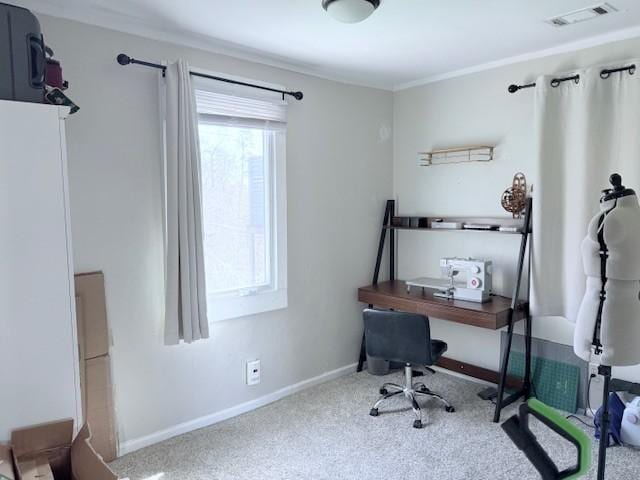 carpeted office space featuring baseboards, visible vents, and ornamental molding