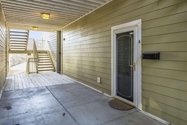 view of patio / terrace featuring stairs