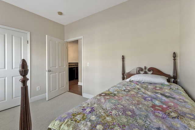 carpeted bedroom with baseboards