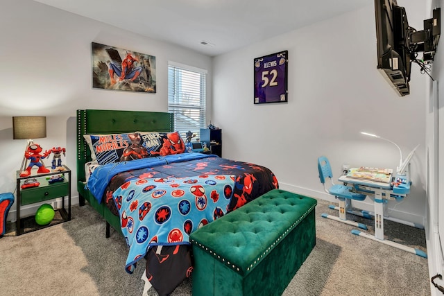 bedroom with baseboards, carpet floors, and visible vents