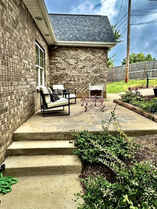 view of patio / terrace with fence