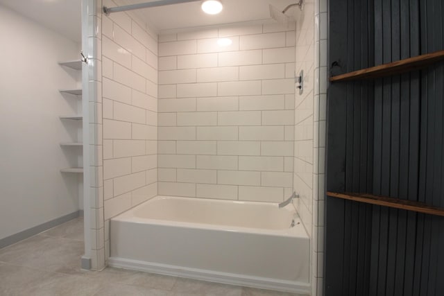 full bath featuring tile patterned floors, shower / bathtub combination, and baseboards