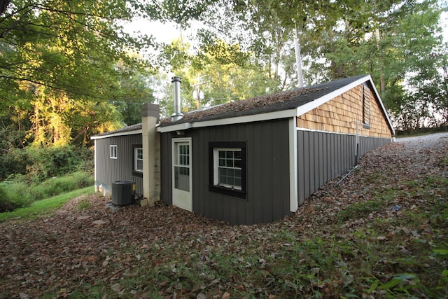 view of outbuilding featuring central air condition unit