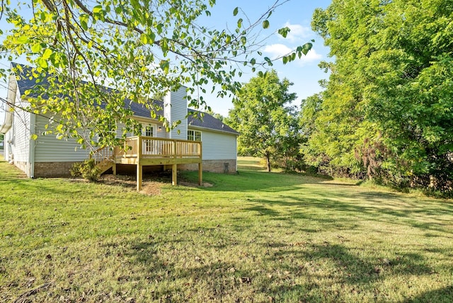 view of yard featuring a wooden deck