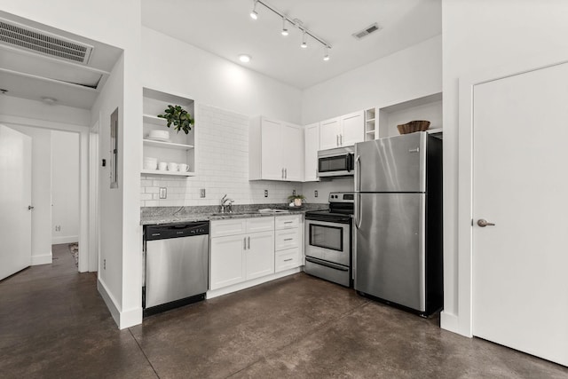 kitchen featuring open shelves, stainless steel appliances, visible vents, and a sink