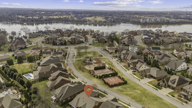 birds eye view of property featuring a residential view and a water view