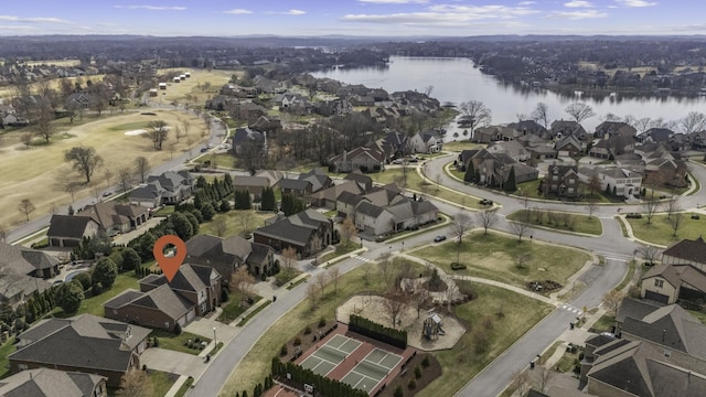 aerial view with a residential view and a water view