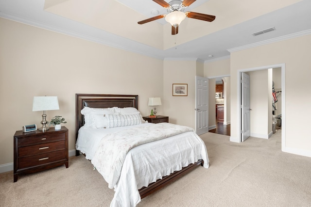 bedroom with crown molding, baseboards, visible vents, and light carpet