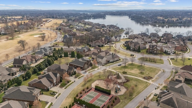 birds eye view of property featuring a residential view and a water view