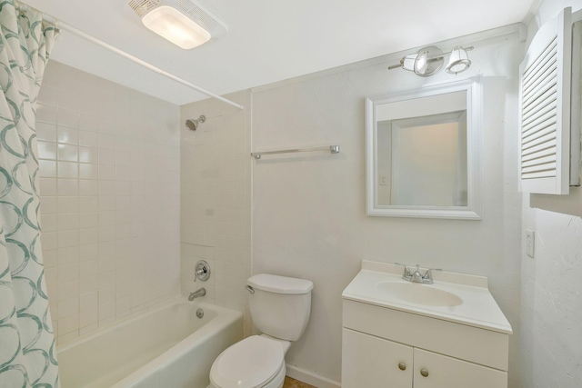 full bath with vanity, toilet, visible vents, and shower / tub combo with curtain