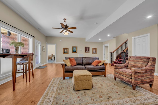 living area featuring recessed lighting, baseboards, ceiling fan, and light wood finished floors