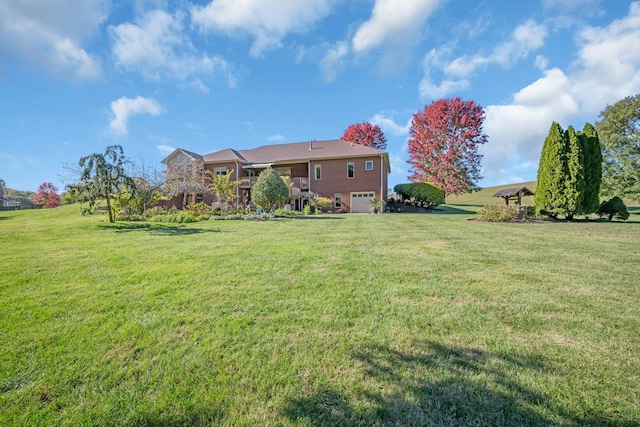 view of yard with a garage