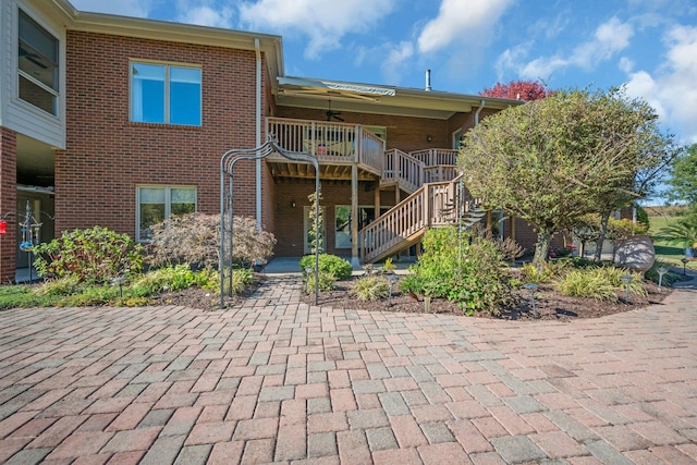 exterior space featuring brick siding