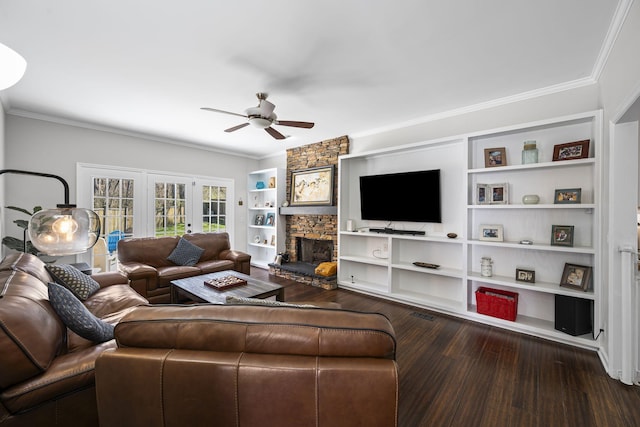 living area with crown molding, dark wood-type flooring, and a ceiling fan