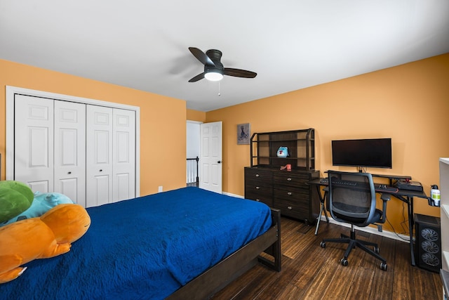 bedroom featuring a closet, baseboards, ceiling fan, and wood finished floors