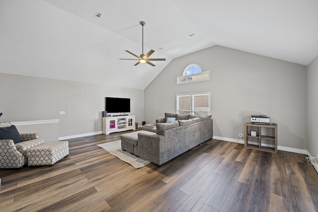 living area featuring ceiling fan, visible vents, lofted ceiling, and dark wood-style floors